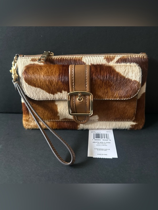 Coach Handbags - NWT Coach Ashton Wristlet In Haircalf With Cow Print
